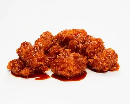 甘辛いソースを絡めたヤンニョムチキンの商品写真